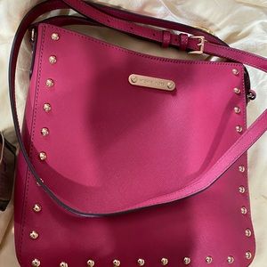 Hot pink crossbody Michaelkors.